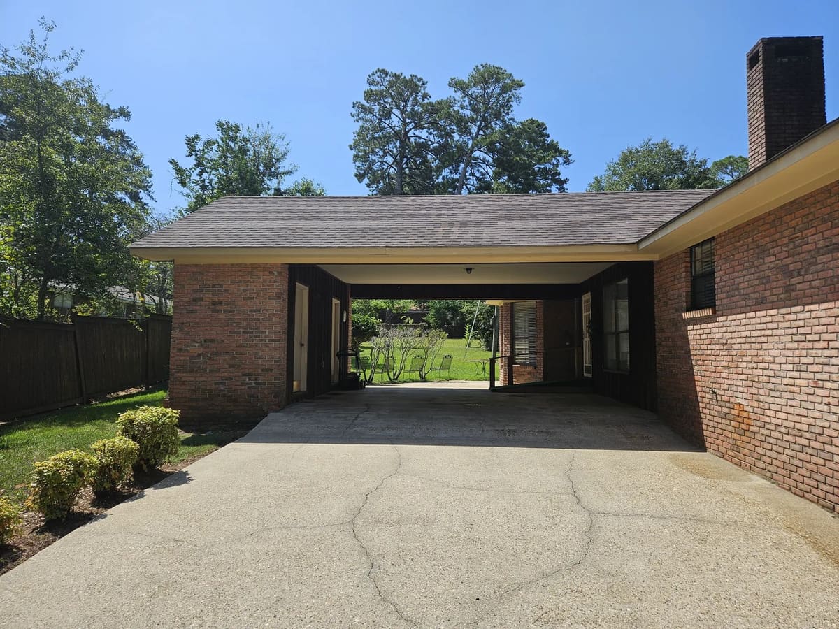 Covered carport after exterior cleaning in Collins, Mississippi