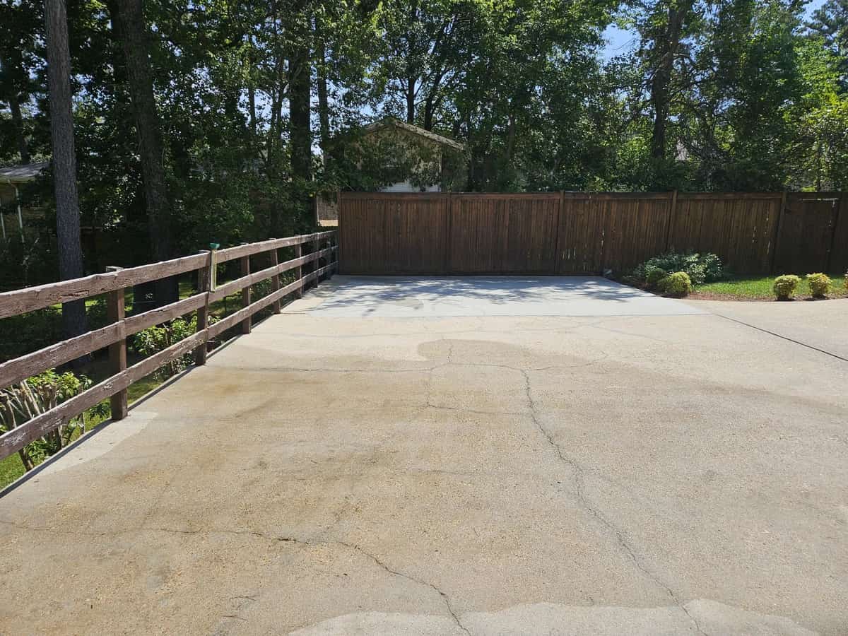 Cleaned upper driveway and gate at a Collins home