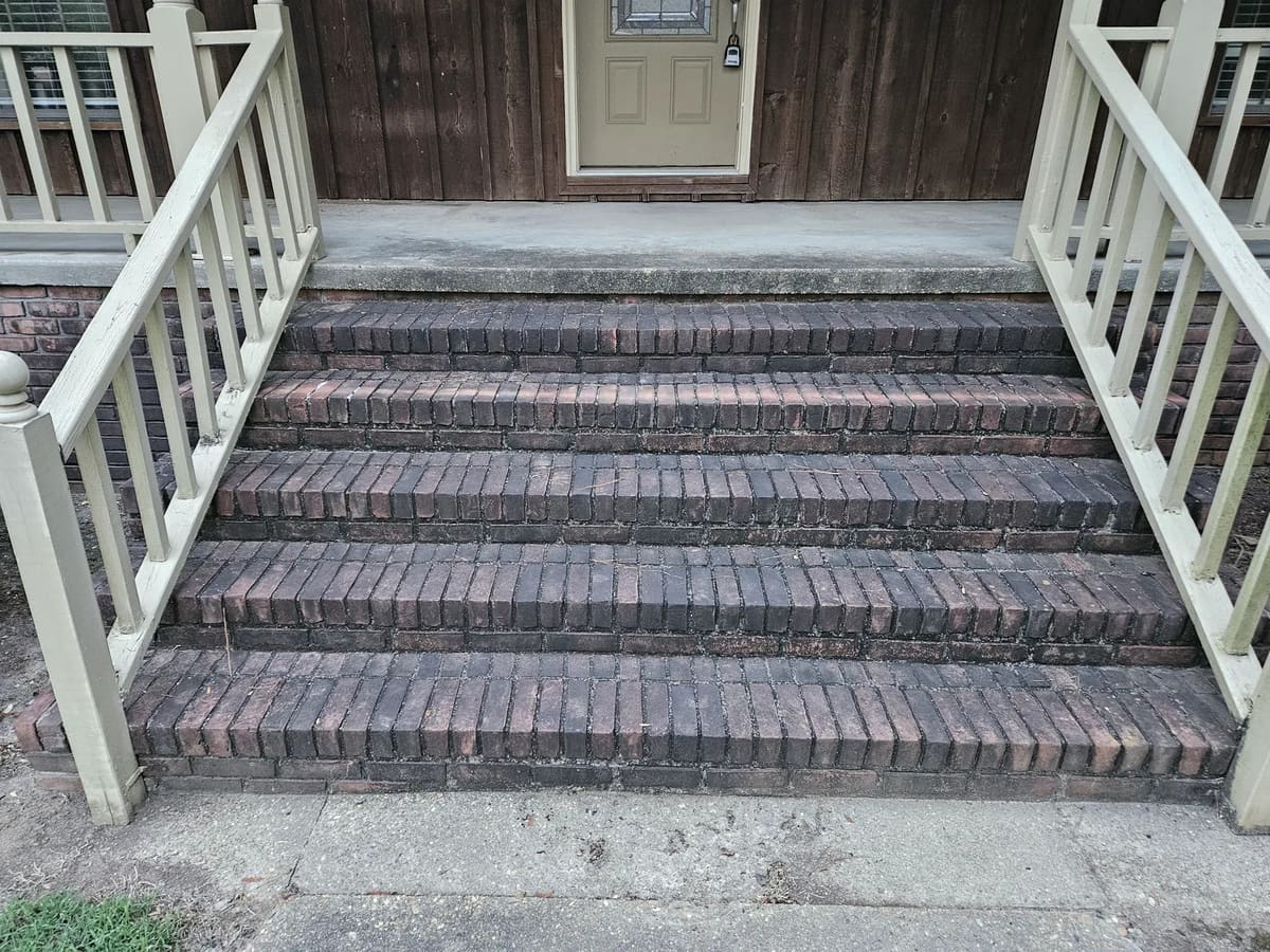 Brick front steps before exterior cleaning in Collins, Mississippi