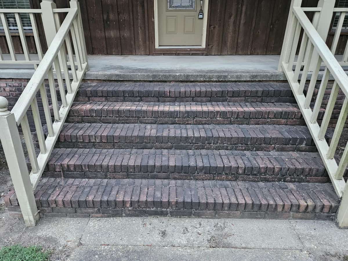 Brick front steps before exterior cleaning in Collins, Mississippi