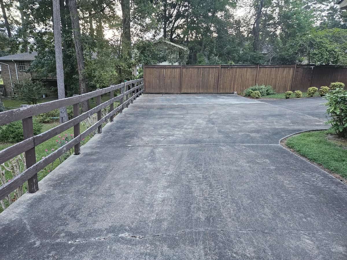 Upper driveway before cleaning at a Collins, Mississippi home
