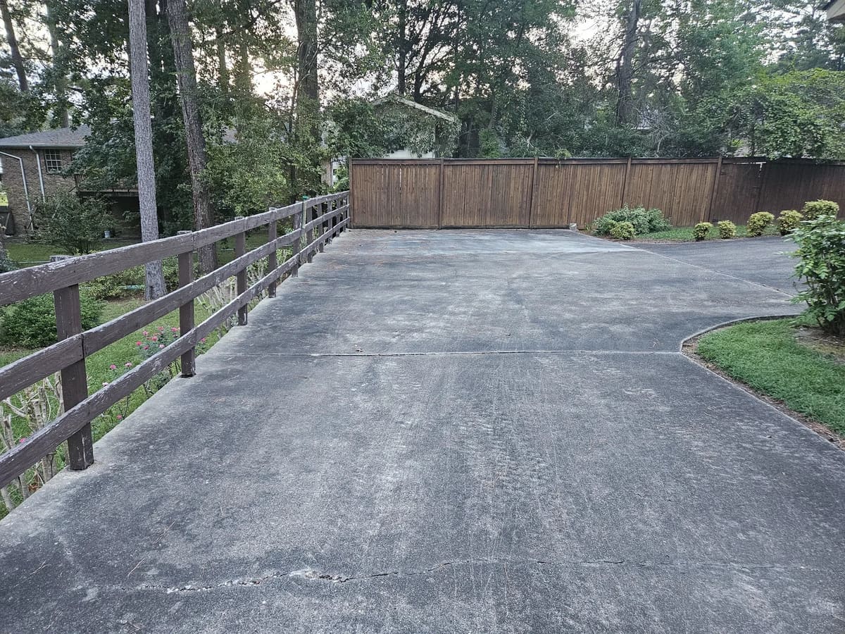Upper driveway before exterior cleaning in Collins, Mississippi