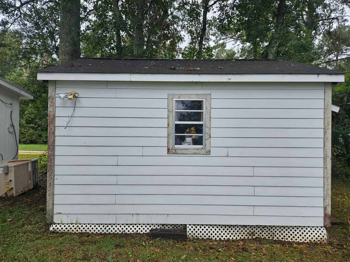 The same outbuilding rear wall after cleaning at Harvest Church in Sanford