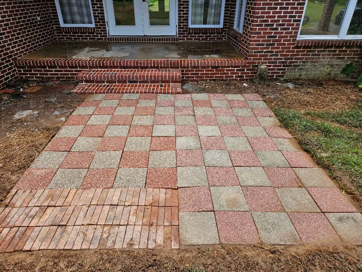 Red and gray patio pavers after cleaning